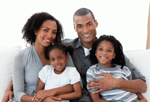 A smiling family of four