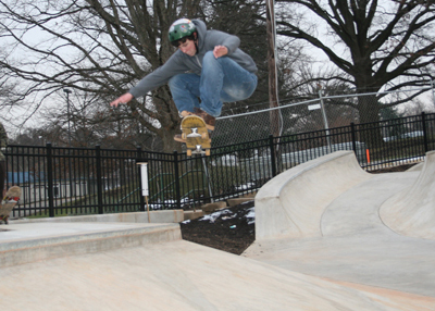 Person jumping on a skateboard