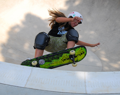 Person about to jump on a skateboard