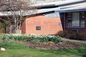 Outside of the Youth Center, red bricks